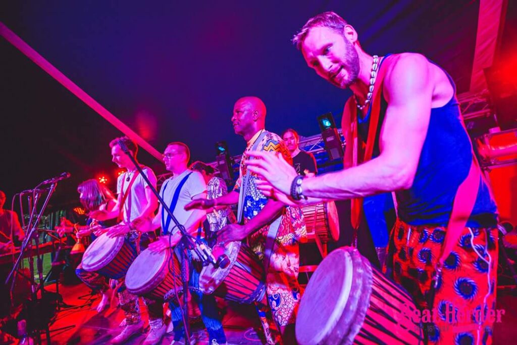 Drumroots performance group playing at Beatherder festival