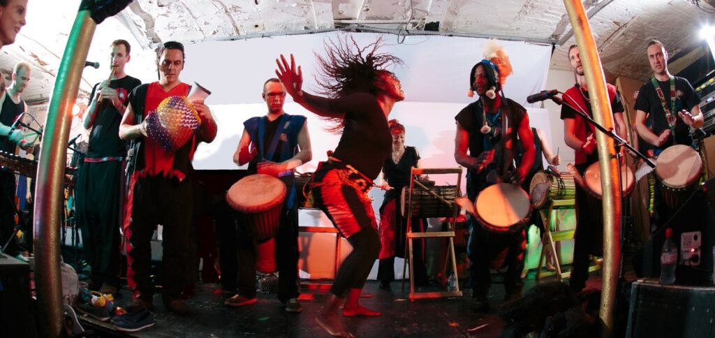 Jokeh Sillah performing traditional Gambian dance with Tanante drummers